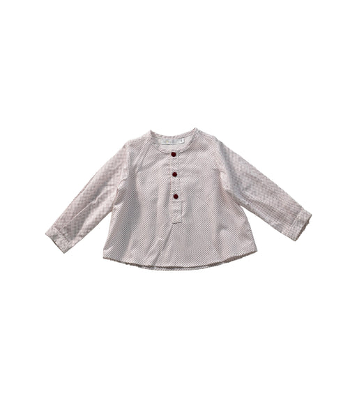 A White Long Sleeve Tops from Paloma de la O in size 6-12M for girl. (Front View)