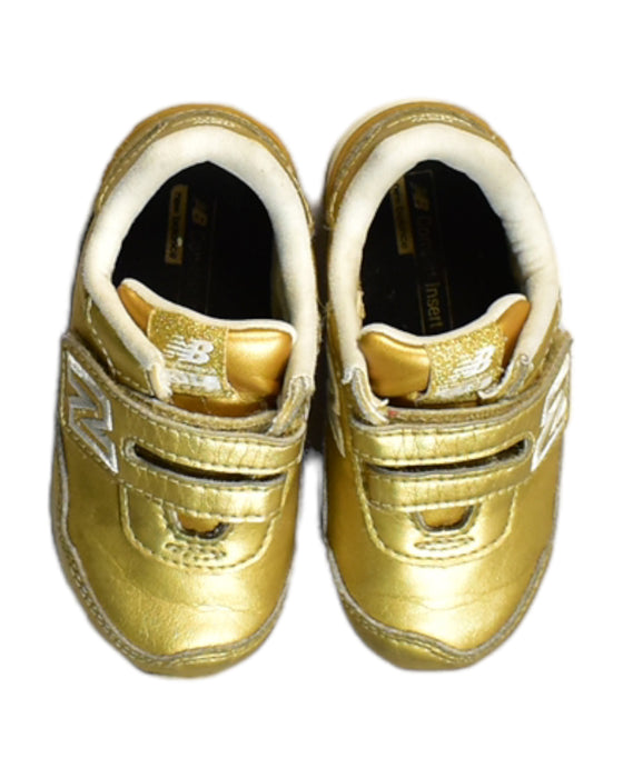 A Gold Sneakers from New Balance in size 18-24M for boy. (Back View)