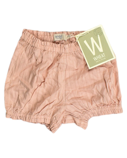 A Pink Shorts from Wheat in size 2T for girl. (Front View)