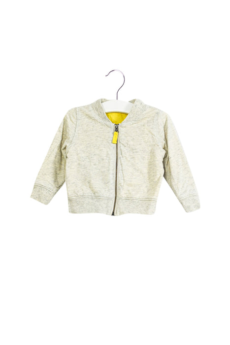 A Beige Lightweight Jackets from The Bonnie Mob in size 6-12M for girl. (Front View)