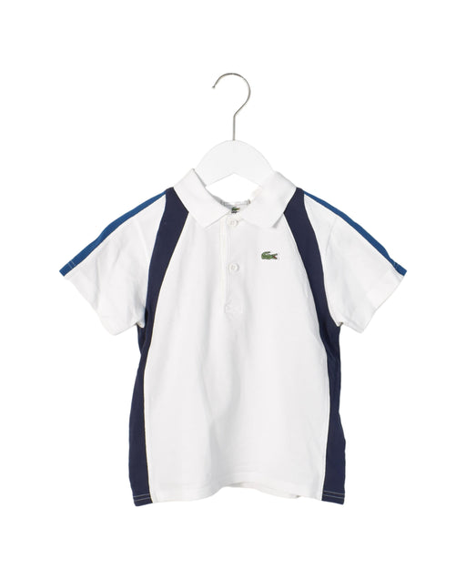 A Navy Short Sleeve Polos from Lacoste in size 6T for boy. (Front View)
