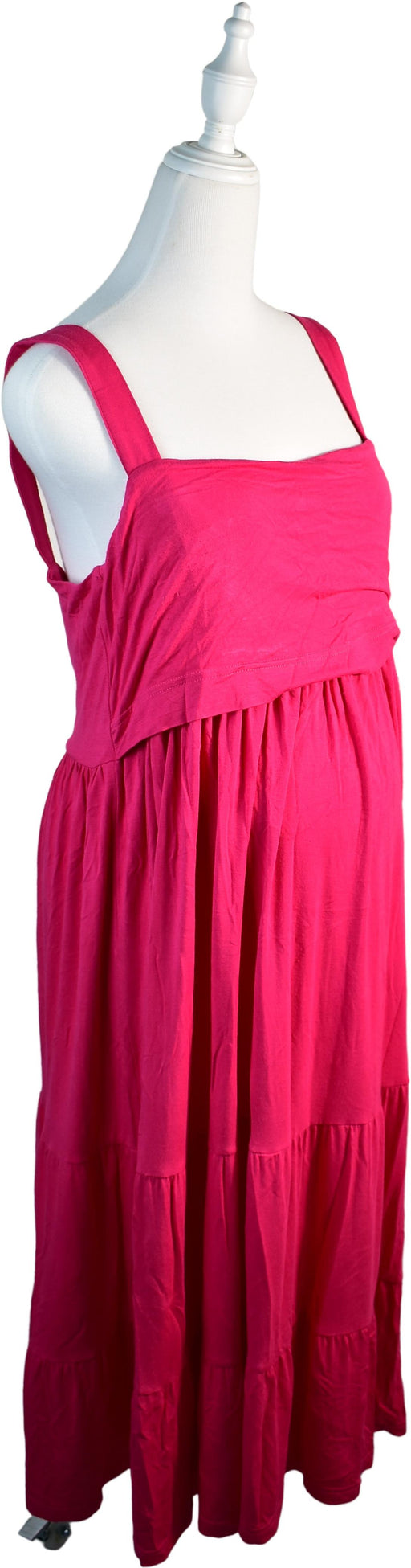 A Pink Sleeveless Dresses from Seraphine in size M for girl. (Front View)