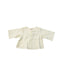 A Ivory Long Sleeve Tops from Bonpoint in size 0-3M for girl. (Front View)