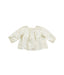 A Ivory Long Sleeve Tops from Bonpoint in size 0-3M for girl. (Front View)