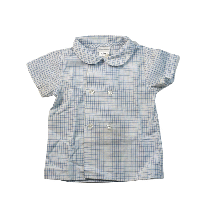 A White Shirts from Dona Carmen in size 6-12M for girl. (Front View)