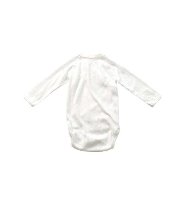 A White Long Sleeve Bodysuits from Petit Bateau in size 3-6M for neutral. (Back View)