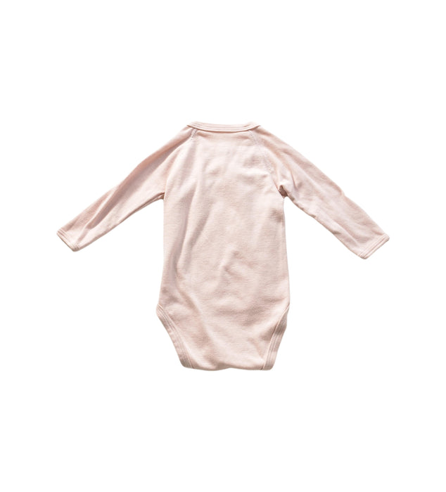A Pink Long Sleeve Bodysuits from Petit Bateau in size 3-6M for neutral. (Back View)