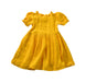A Yellow Short Sleeve Dresses from Seed in size 12-18M for girl. (Back View)