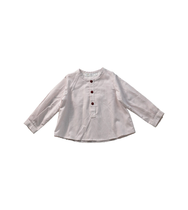 A White Long Sleeve Tops from Paloma de la O in size 6-12M for girl. (Front View)