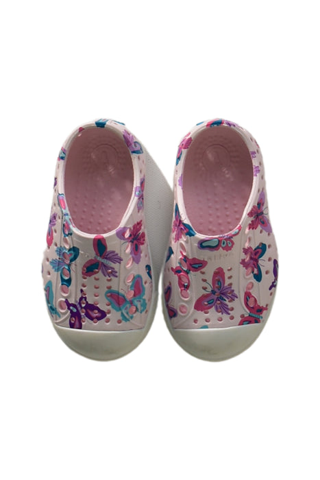 A Pink Slip Ons from Native Shoes in size 12-18M for girl. (Back View)