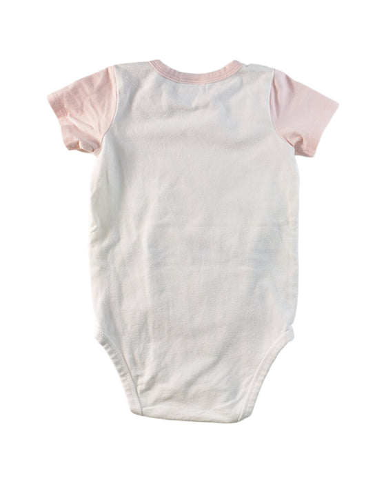 A Pink Short Sleeve Bodysuits from Seed in size 3-6M for girl. (Back View)