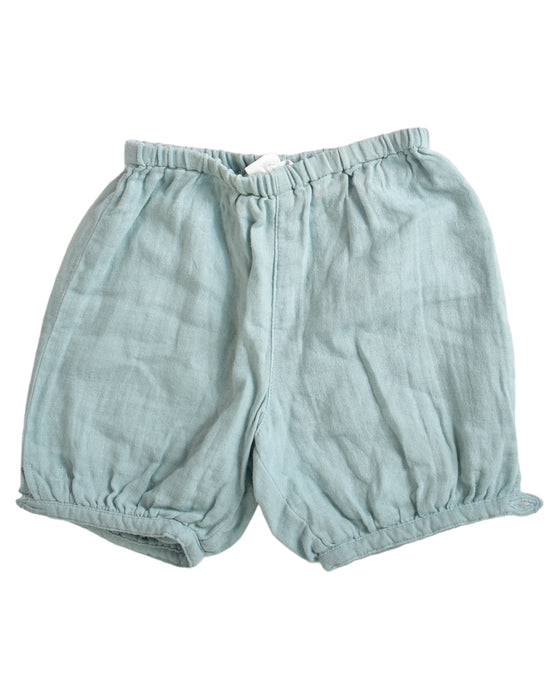 A Green Shorts from Chateau de Sable in size 6-12M for neutral. (Front View)