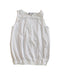 A White Sleeveless Tops from Christian Dior in size 6T for girl. (Front View)