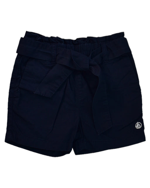 A Blue Shorts from Petit Bateau in size 4T for girl. (Front View)