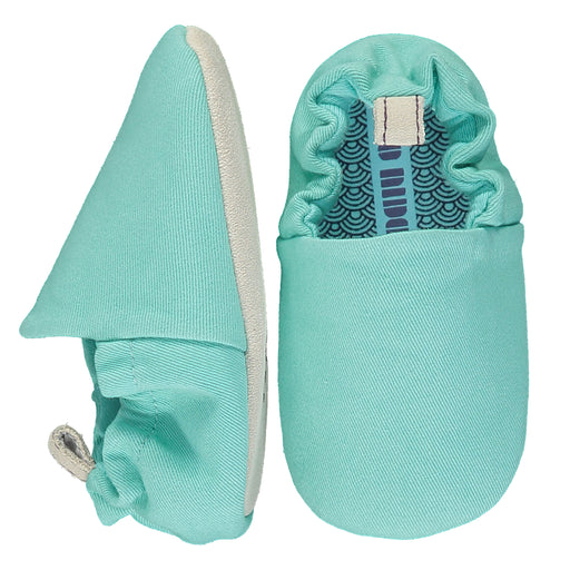 A Blue Slip Ons from Poco Nido in size 18-24M for neutral. (Front View)