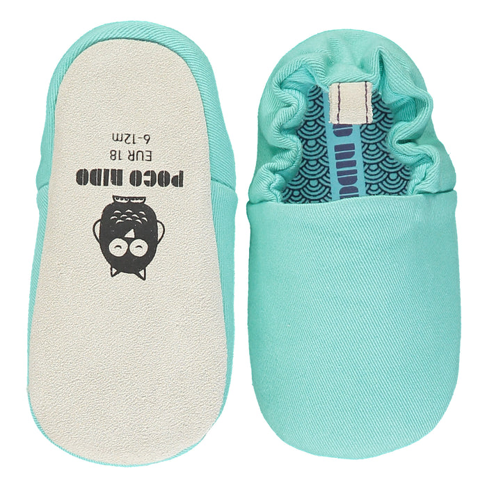 A Blue Slip Ons from Poco Nido in size 18-24M for neutral. (Back View)