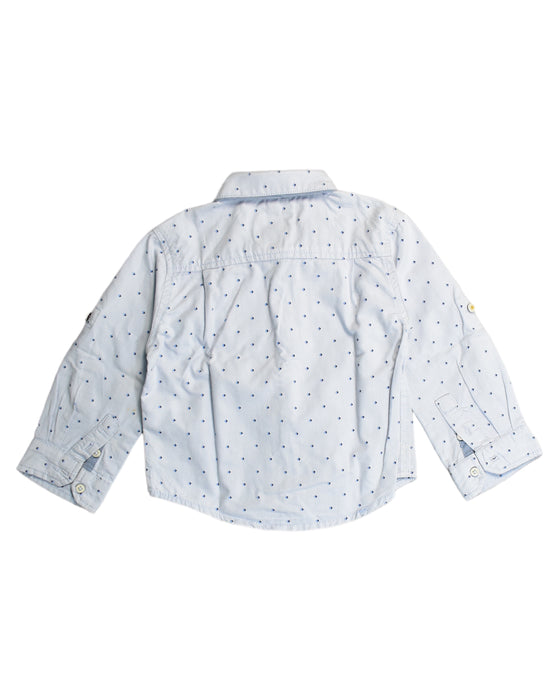 A Blue Shirts from PONEY in size 4T for boy. (Back View)
