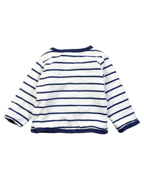 A White Cardigans from Jacadi in size 6-12M for girl. (Back View)