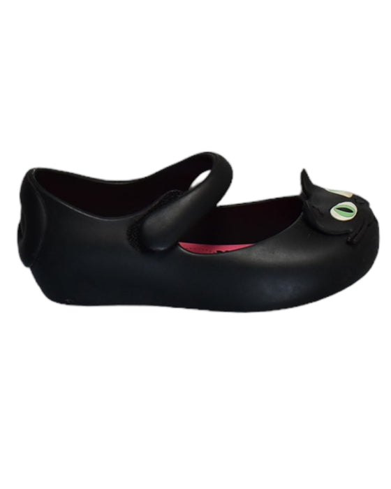 A Black Flats from Mini Melissa in size 4T for girl. (Front View)