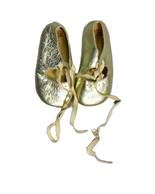 A Gold Flats from Bonpoint in size 12-18M for girl. (Front View)