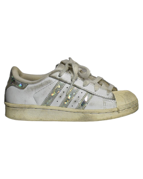 A White Sneakers from Adidas in size 5T for girl. (Front View)