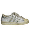 A White Sneakers from Adidas in size 5T for girl. (Front View)
