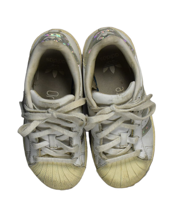 A White Sneakers from Adidas in size 5T for girl. (Back View)