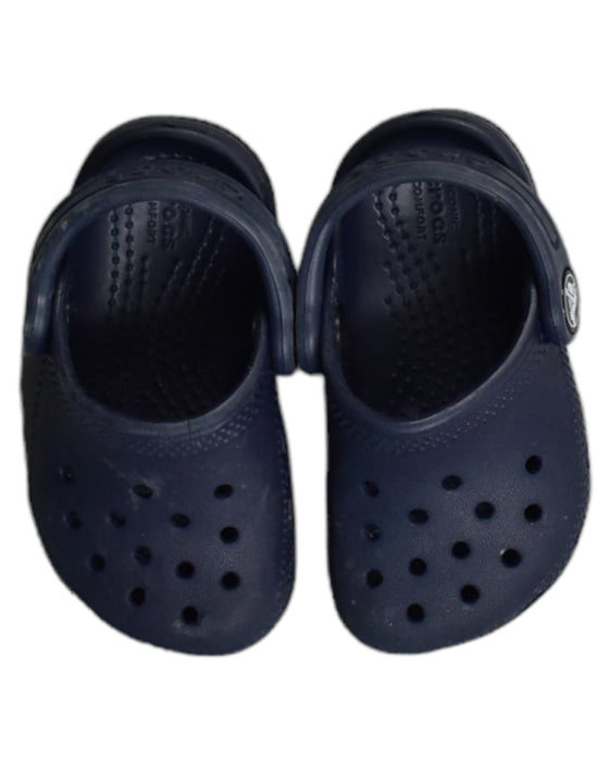 A Blue Sandals from Crocs in size 12-18M for boy. (Back View)