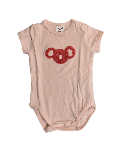 A Pink Bodysuits from Seed in size 0-3M for girl. (Front View)