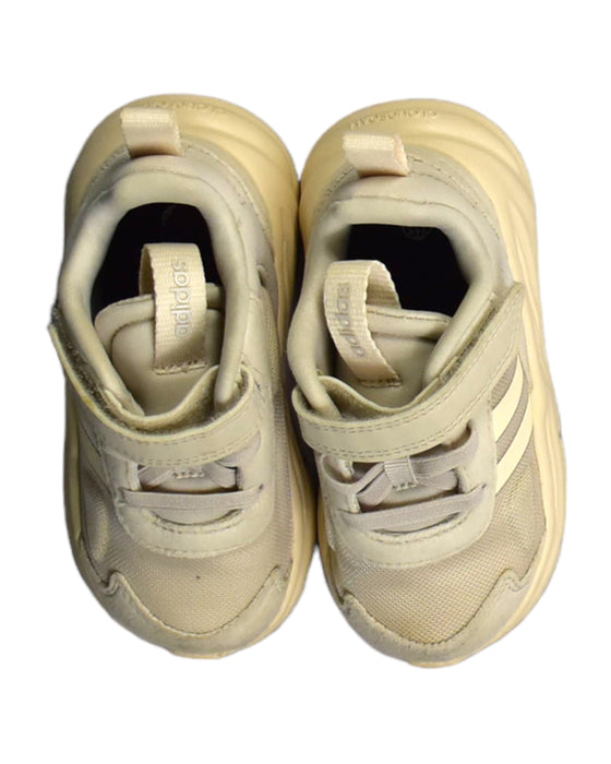 A White Sneakers from Adidas in size 18-24M for girl. (Back View)