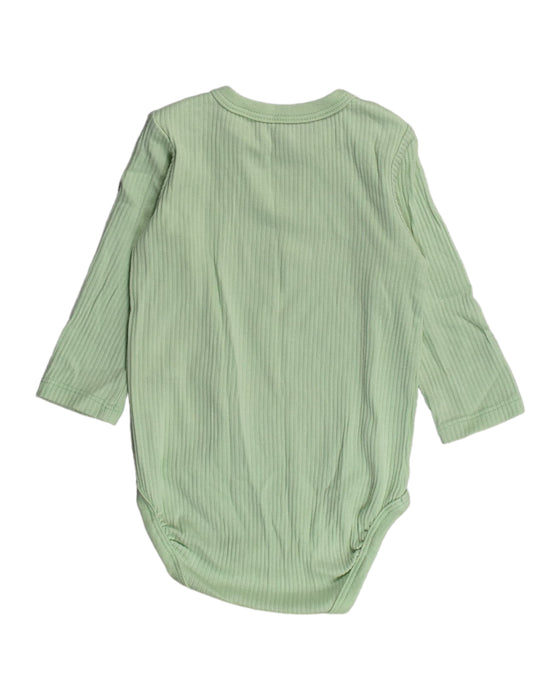A Green Bodysuits from Arket in size 3-6M for neutral. (Back View)
