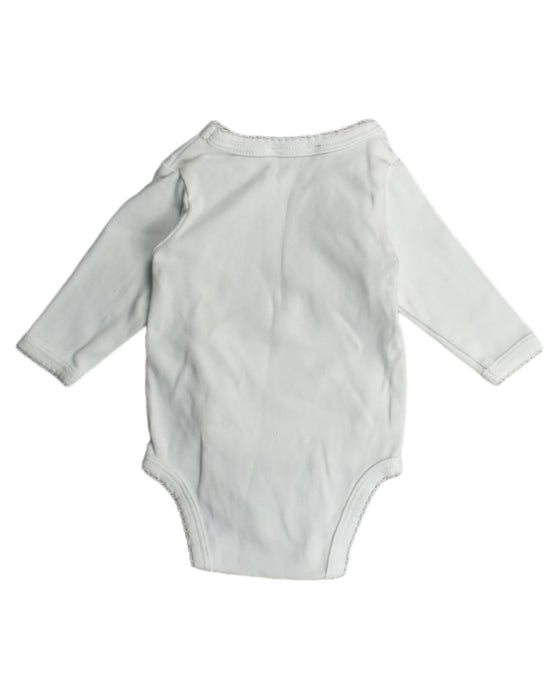 A White Bodysuits from Jacadi in size Newborn for neutral. (Back View)