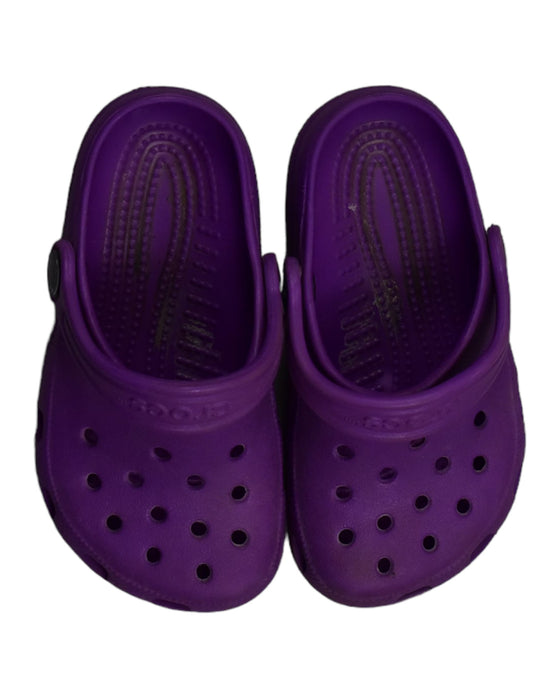 A Purple Sandals from Crocs in size 4T for girl. (Back View)