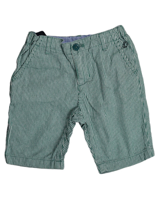 A Green Shorts from Petit Bateau in size 4T for boy. (Front View)