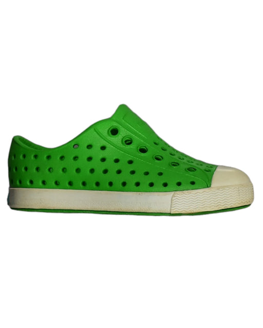 A Green Slip Ons from Native Shoes in size 18-24M for neutral. (Front View)
