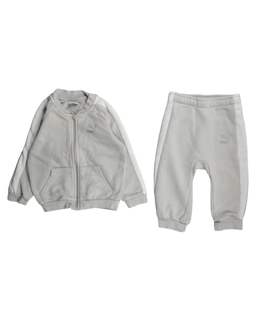 A White Pants Sets from Puma in size 6-12M for boy. (Front View)