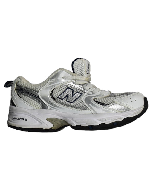 A White Sneakers from New Balance in size 5T for boy. (Front View)