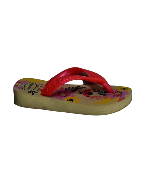A Yellow Slippers from Havaianas in size 4T for girl. (Front View)