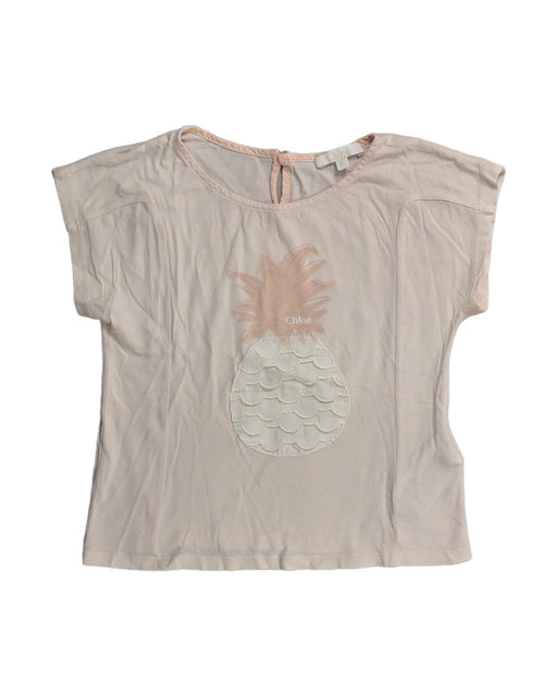 A Pink Short Sleeve Tops from Chloe in size 5T for girl. (Front View)