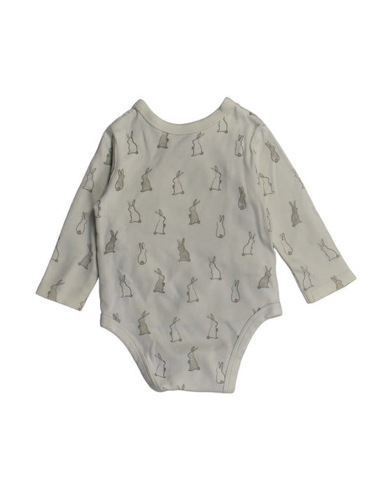 A White Bodysuits from Pehr in size 3-6M for neutral. (Back View)