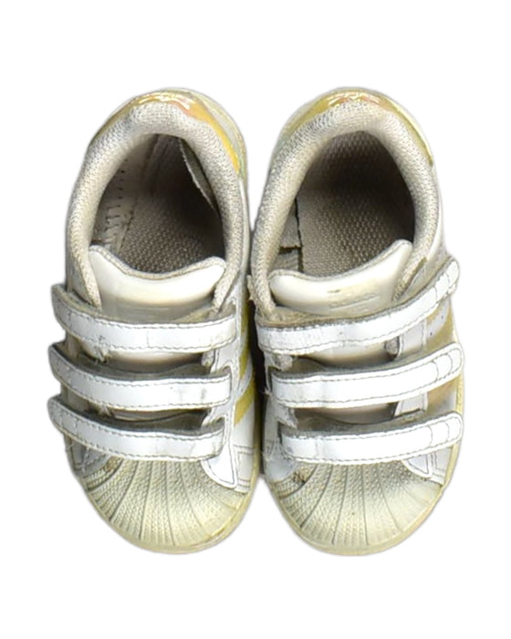 A White Sneakers from Adidas in size 18-24M for neutral. (Back View)