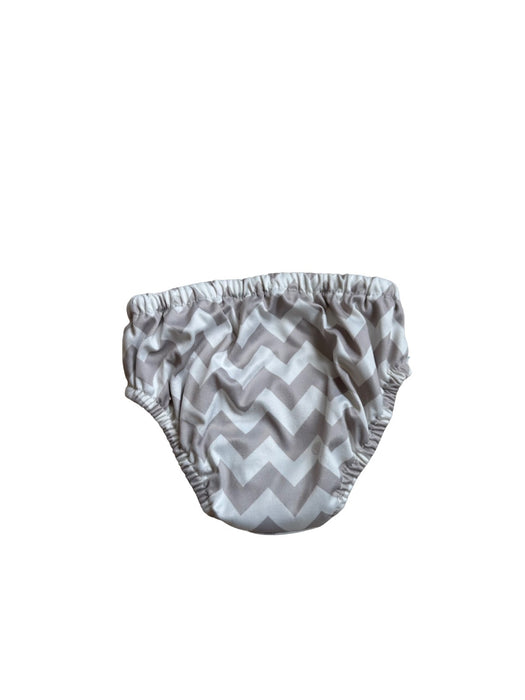 A White Swim Diapers from Charlie Banana in size 6-12M for neutral. (Back View)