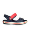 A Blue Sandals from Crocs in size 5T for boy. (Front View)