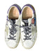 A White Sneakers from Golden Goose in size 7Y for girl. (Back View)
