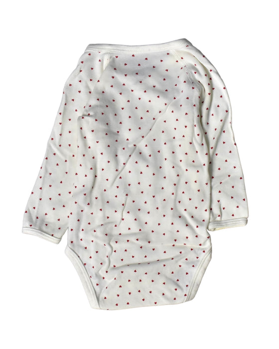 A White Long Sleeve Bodysuits from Petit Bateau in size 3-6M for girl. (Back View)