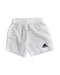 A White Shorts from Adidas in size 6T for boy. (Front View)