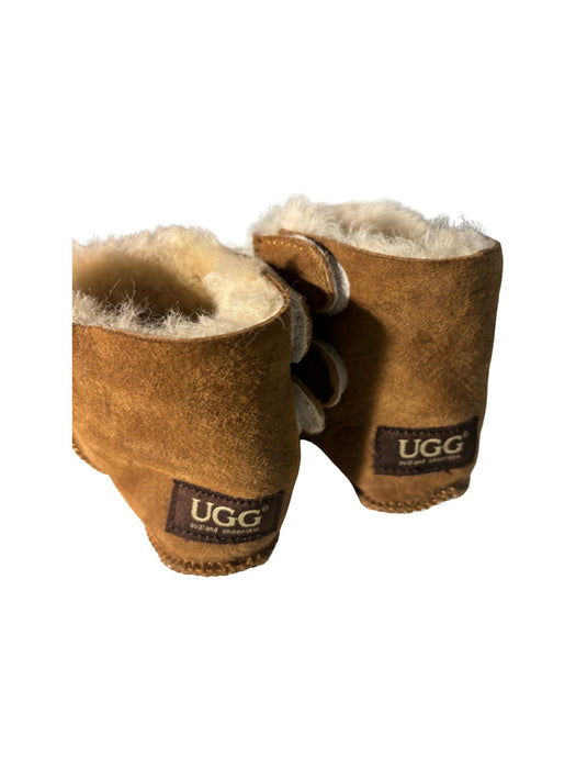 A Brown Winter Boots from UGG Since 1974 in size 12-18M for neutral. (Back View)