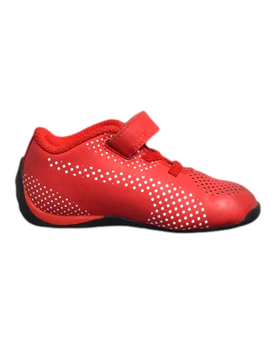 A Red Sneakers from Puma in size 18-24M for boy. (Front View)