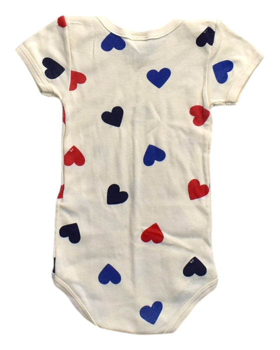 A Beige Short Sleeve Bodysuits from Petit Bateau in size 6-12M for girl. (Back View)