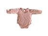 A Pink Long Sleeve Bodysuits from Mori in size 3-6M for girl. (Back View)